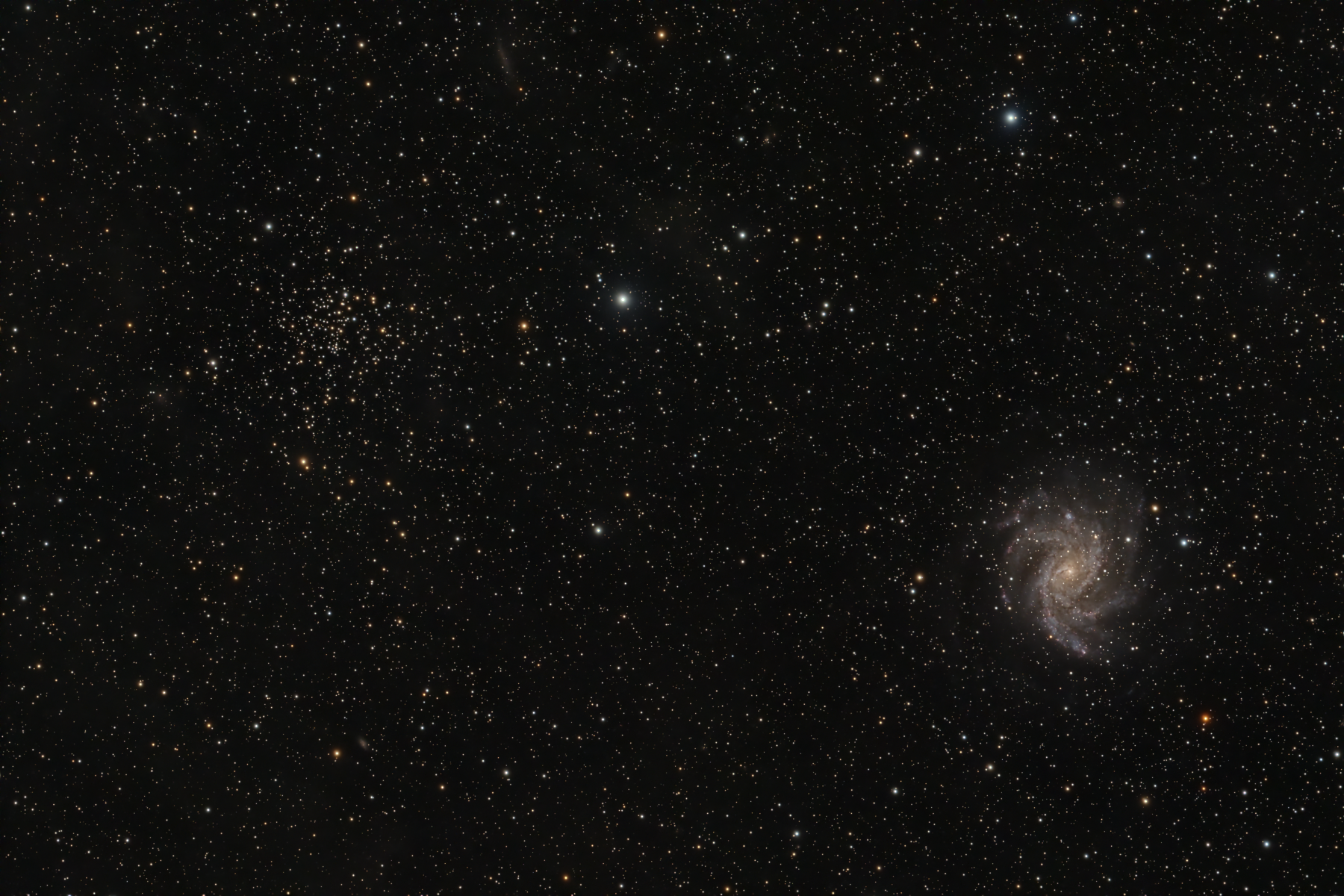 NGC 6939 and NGC 6946, The Fireworks Galaxy
